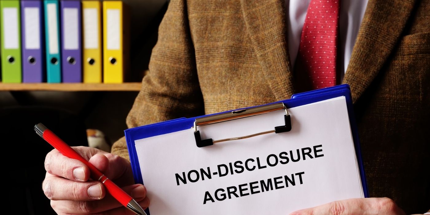 An NDA covers what two companies owe each other. It says nothing about the person in the photographs.
